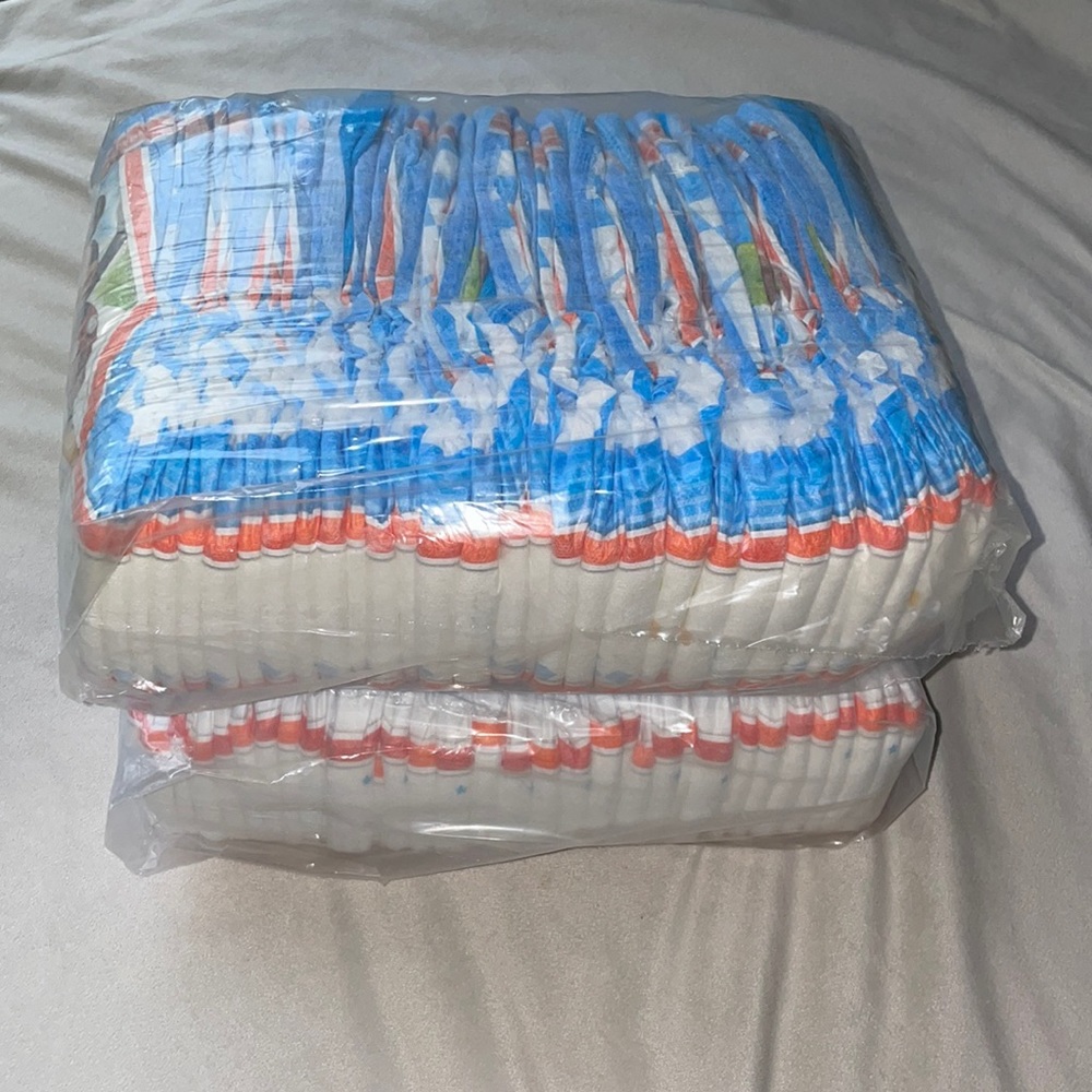 Two 34-count packs of pull-ups + 14 loose 4T-5T (82 total)